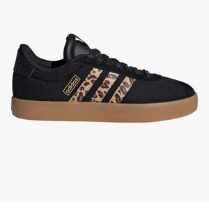 Adidas Black womans Sneakers size 6.5 with animal Stripes. Sold out everywhere